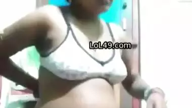 Unsatisfied village wife fingering pussy in horniness